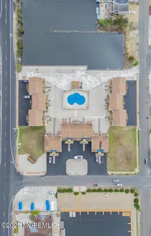a view of a balcony with wooden floor