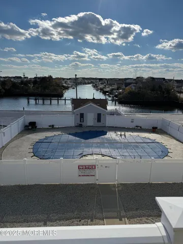 a view of hallway with windows
