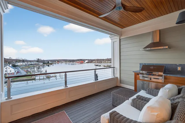 a view of living room with furniture and window