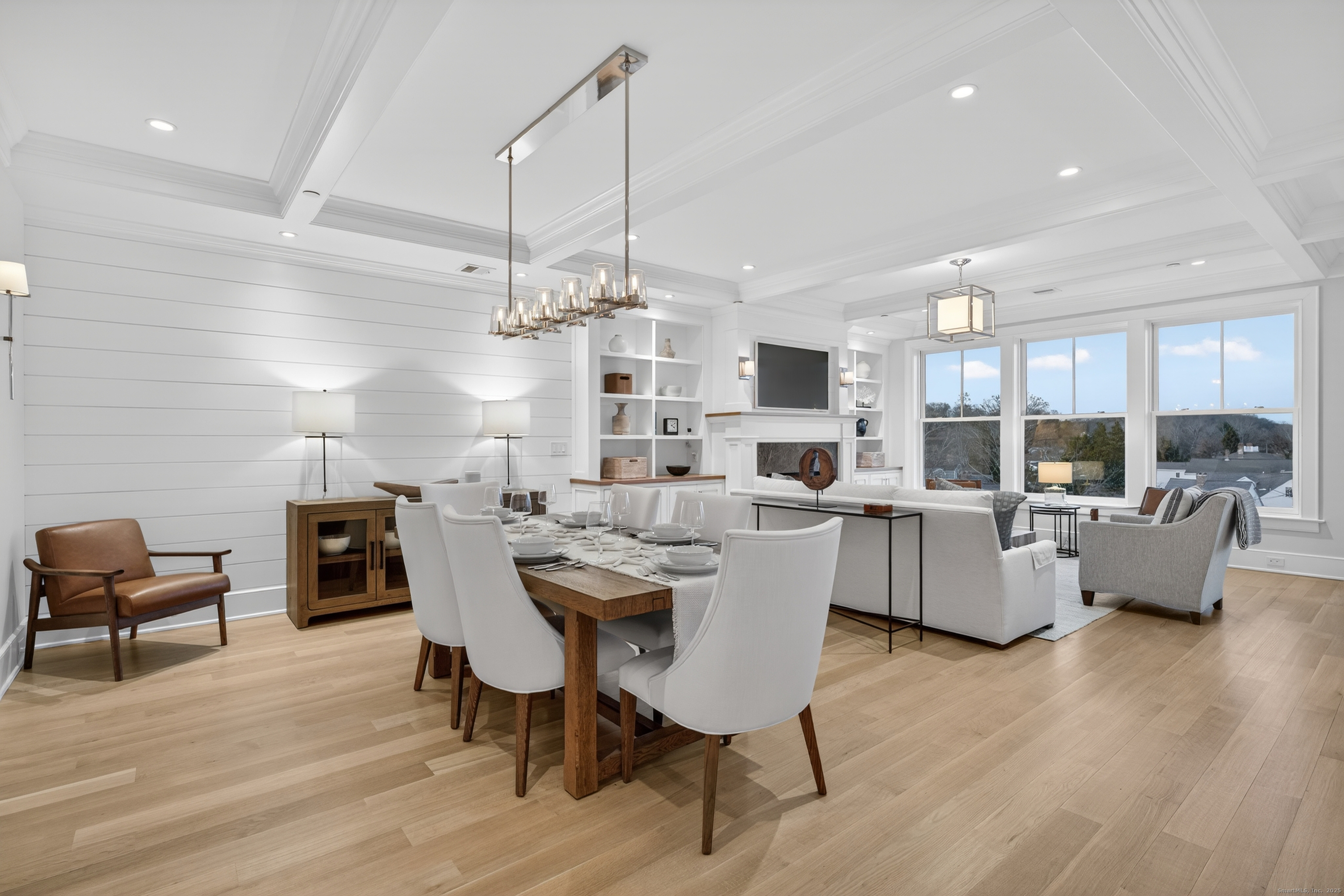 22 West Main Street, Unit 11 Groton, CT 06355 - Photo 12 of 40 a view of a dining room with furniture window and wooden floor