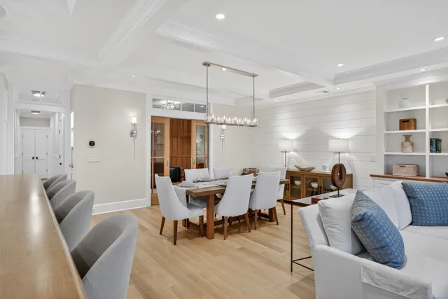 a living room with furniture fireplace and flat screen tv