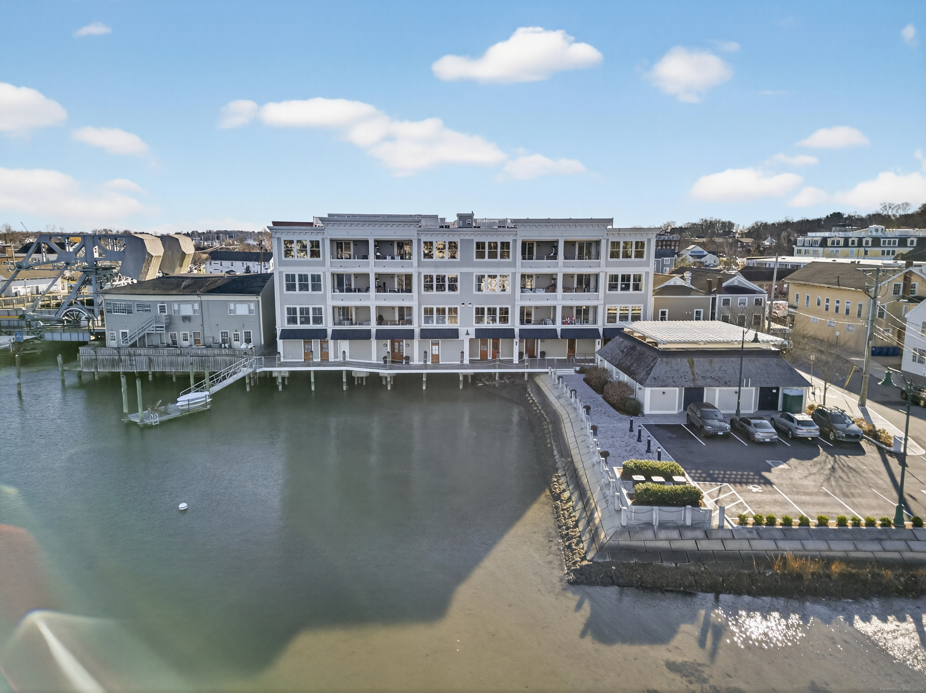 22 West Main Street, Unit 11 Groton, CT 06355 - Photo 2 of 40 a view of a lake with outdoor space