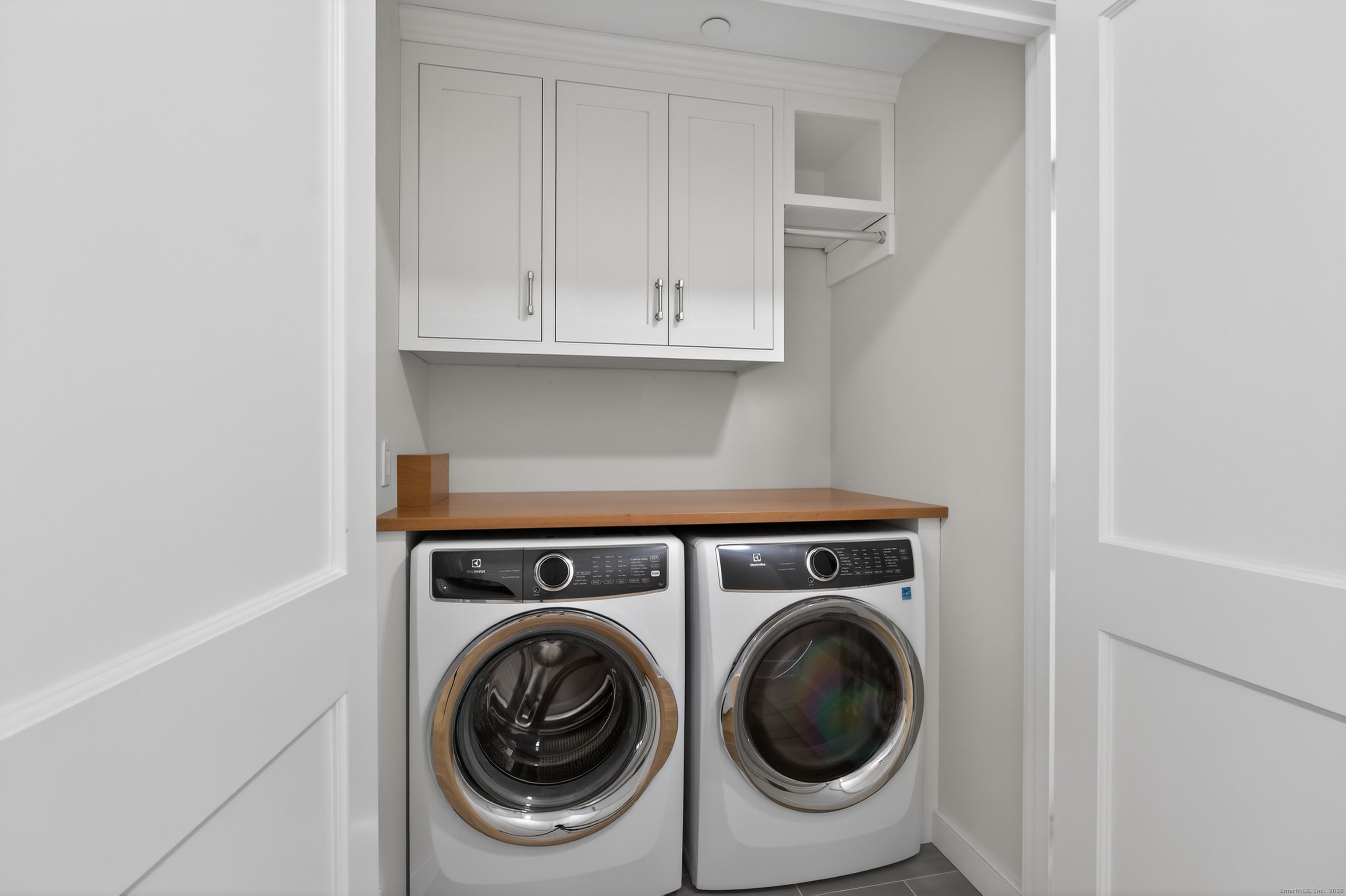 22 West Main Street, Unit 11 Groton, CT 06355 - Photo 23 of 40 a utility room with dryer and washer