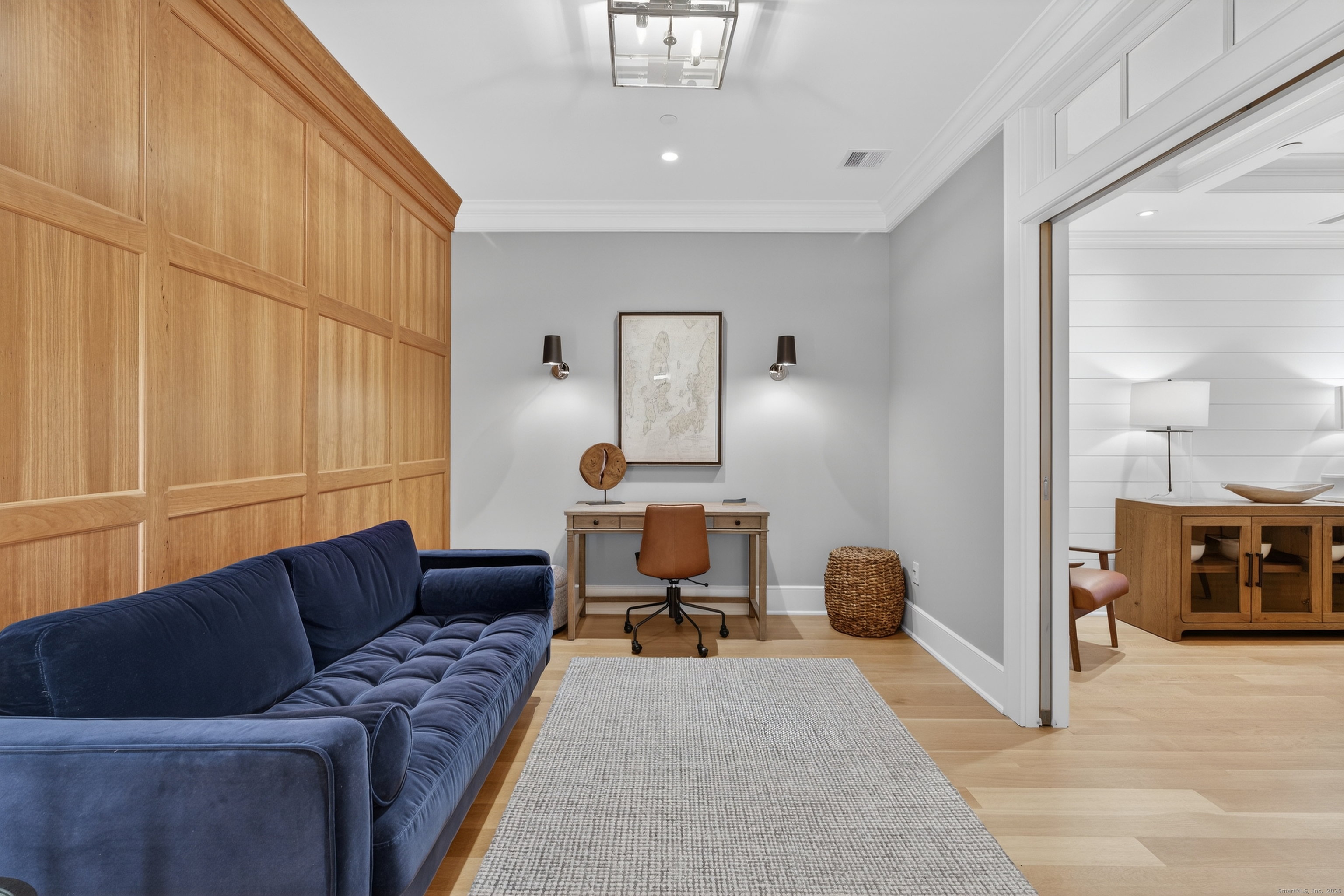 22 West Main Street, Unit 11 Groton, CT 06355 - Photo 24 of 40 a living room with furniture and a large window