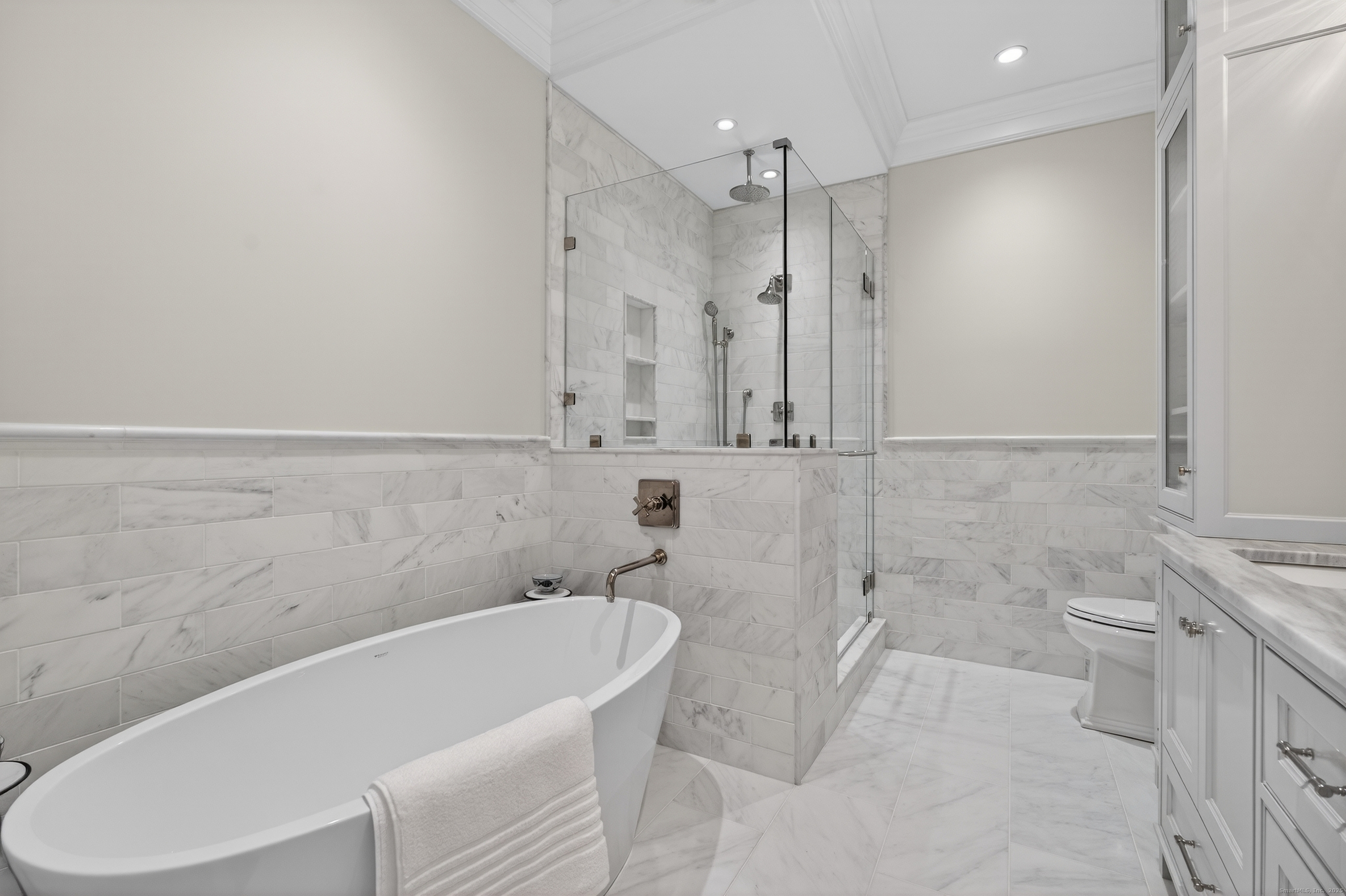 22 West Main Street, Unit 11 Groton, CT 06355 - Photo 29 of 40 a bathroom with a bathtub and a toilet