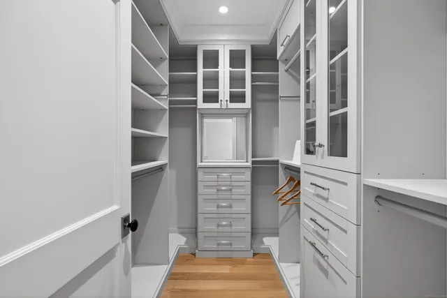 a bedroom with bed and window