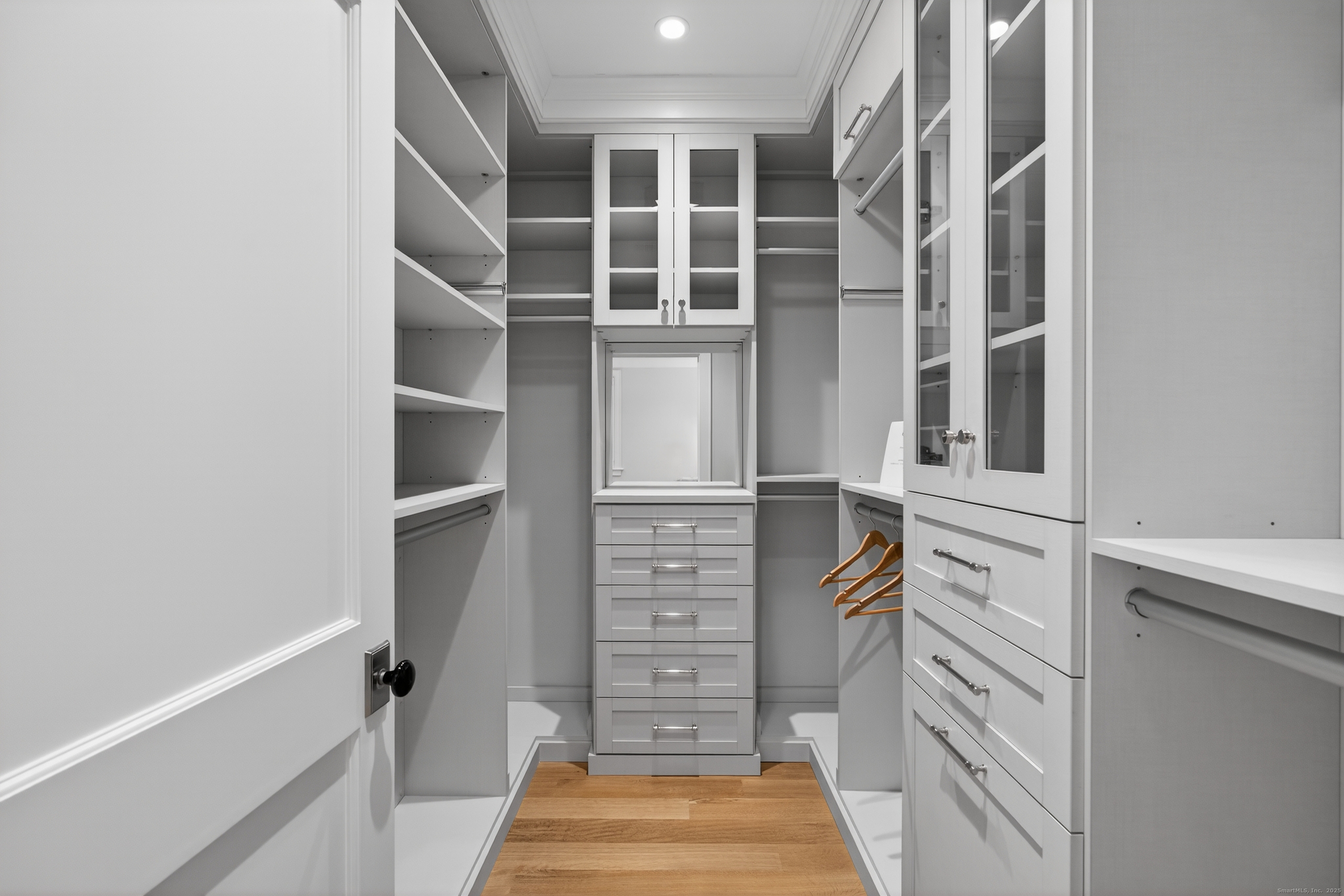 22 West Main Street, Unit 11 Groton, CT 06355 - Photo 30 of 40 a view of walk in closet with empty racks