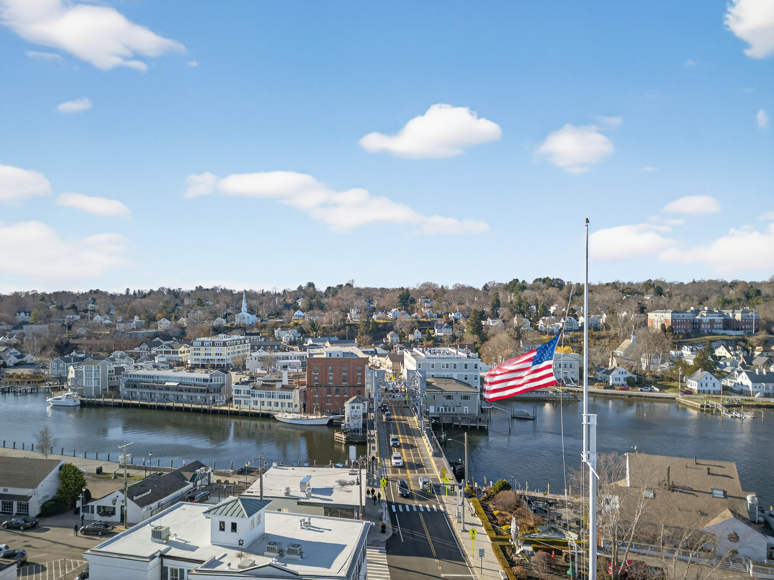 22 West Main Street, Unit 11 Groton, CT 06355 - Photo 37 of 40 a view of a lake and a city
