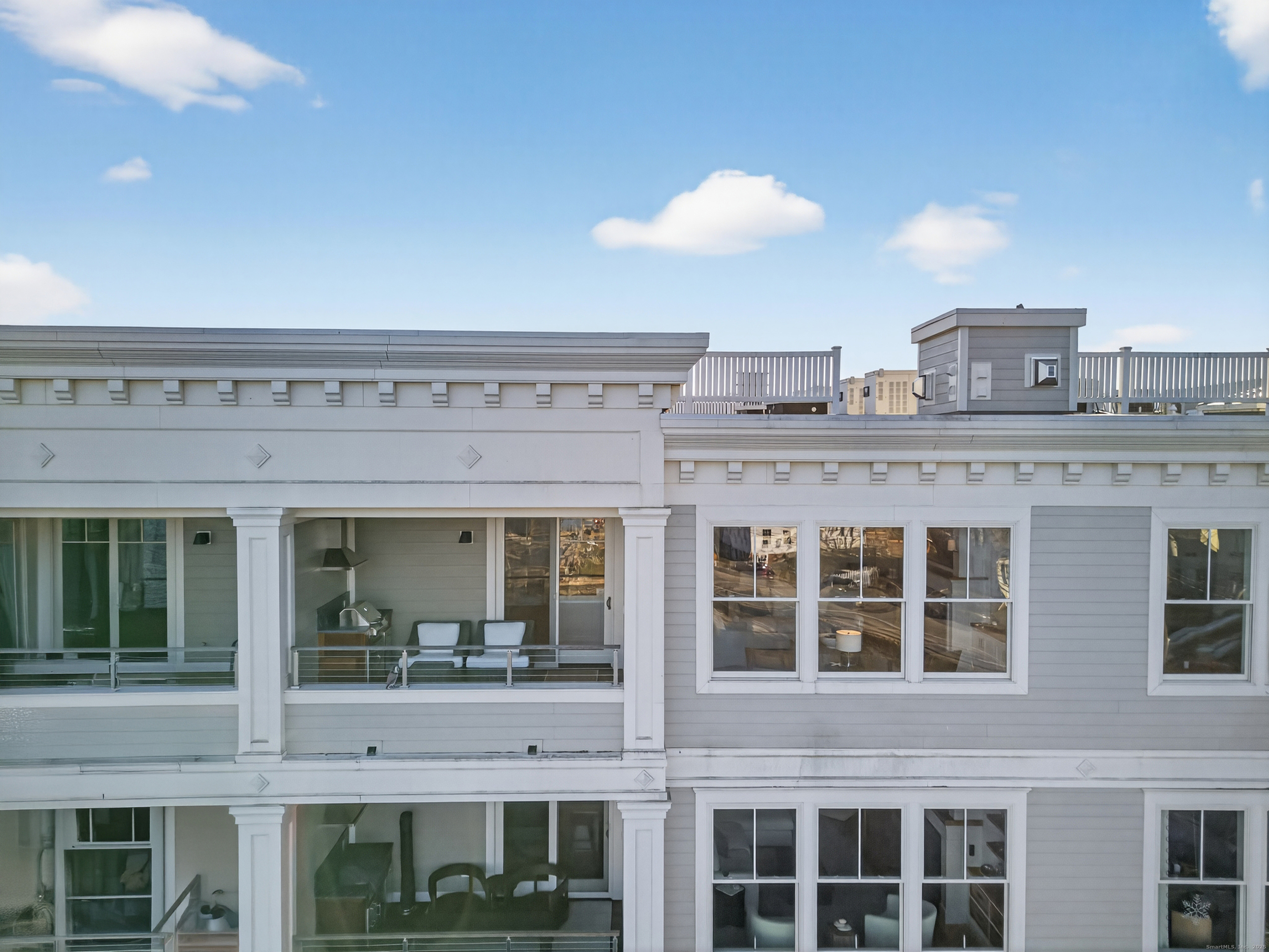 22 West Main Street, Unit 11 Groton, CT 06355 - Photo 39 of 40 a view of a building with a lot of windows
