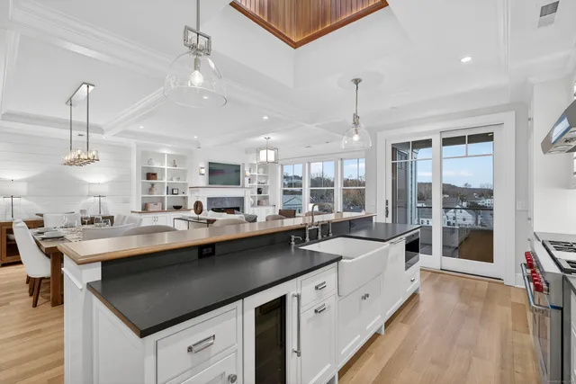 a kitchen with a sink and stove