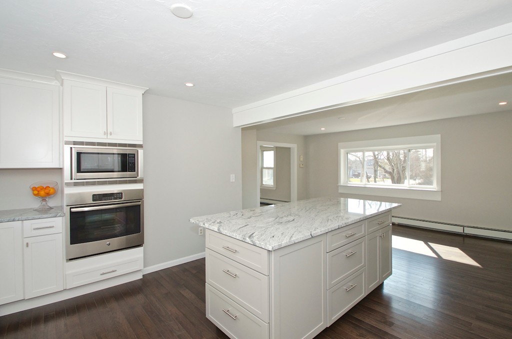 29 Hatherly Road Scituate, MA 02066 - Photo 11 of 29 a kitchen with stainless steel appliances granite countertop a stove and a sink