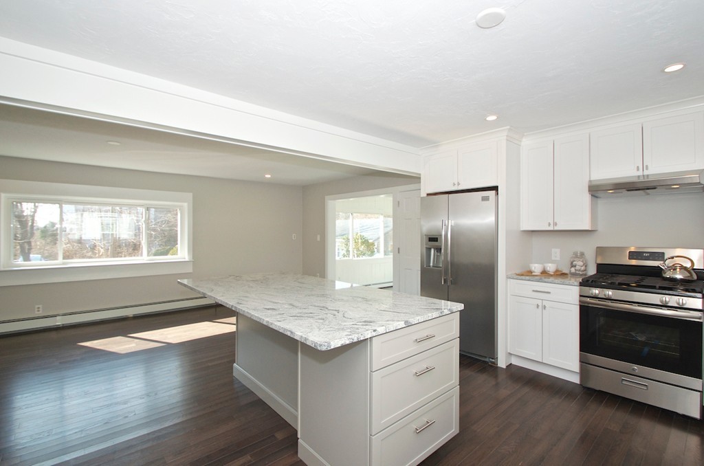 29 Hatherly Road Scituate, MA 02066 - Photo 13 of 29 a kitchen with a center island wooden floor and stainless steel appliances