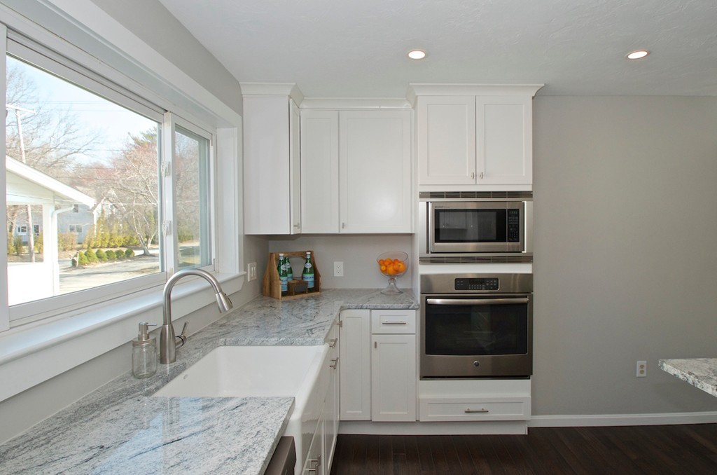 29 Hatherly Road Scituate, MA 02066 - Photo 16 of 29 a kitchen with granite countertop white cabinets and stainless steel appliances