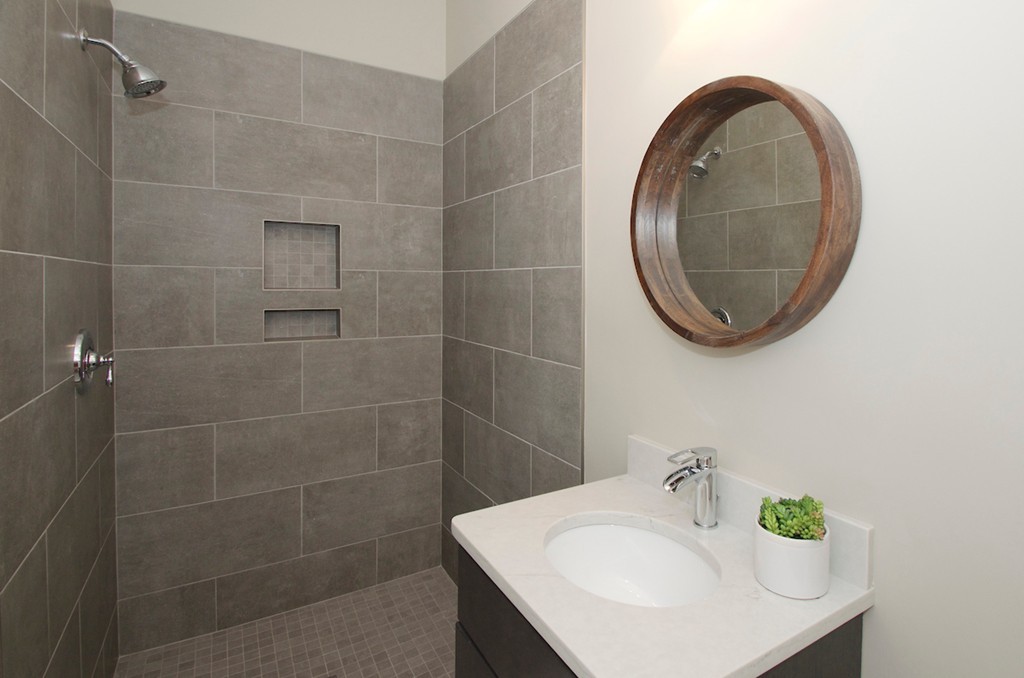 29 Hatherly Road Scituate, MA 02066 - Photo 18 of 29 a bathroom with a sink and a mirror