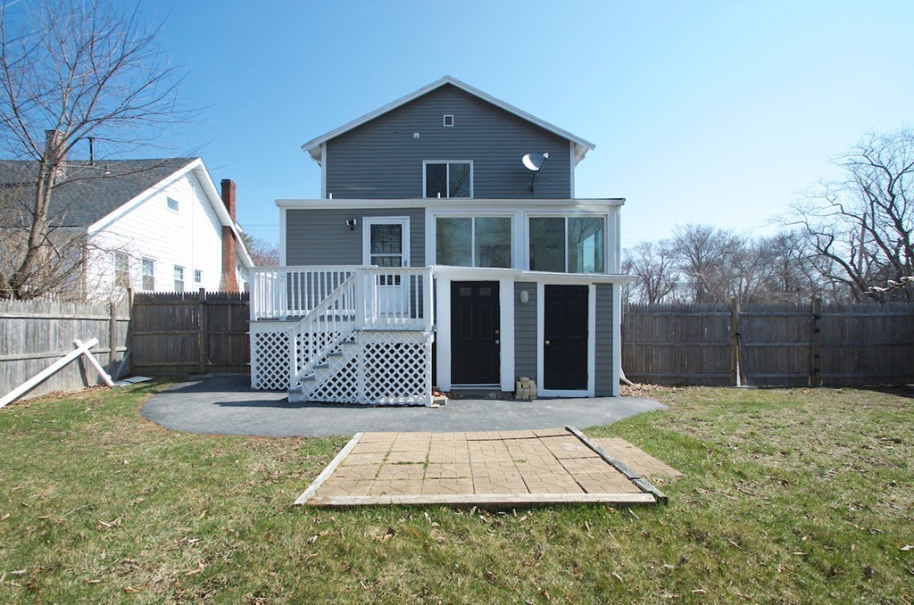 29 Hatherly Road Scituate, MA 02066 - Photo 28 of 29 a front view of a house with a yard