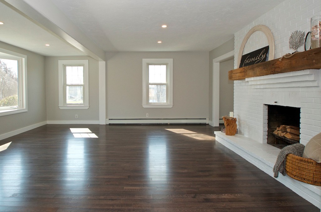 29 Hatherly Road Scituate, MA 02066 - Photo 5 of 29 an empty room with wooden floor fireplace and windows