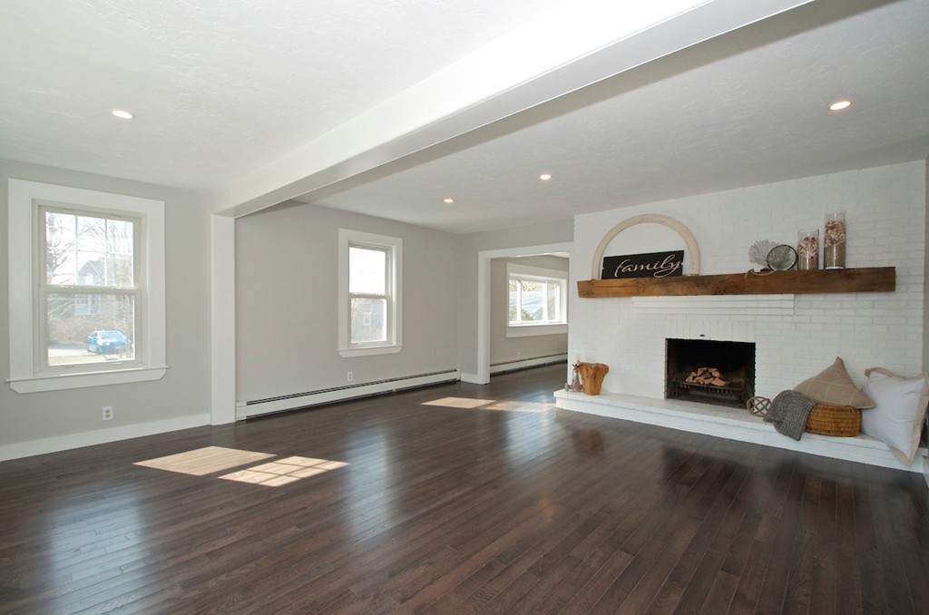 29 Hatherly Road Scituate, MA 02066 - Photo 6 of 29 an empty room with windows and a fireplace