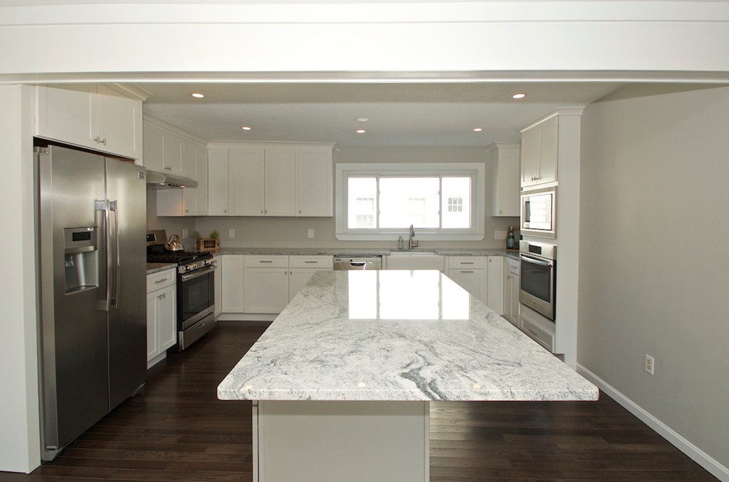 29 Hatherly Road Scituate, MA 02066 - Photo 9 of 29 a kitchen with stainless steel appliances granite countertop a refrigerator a sink a stove and oven