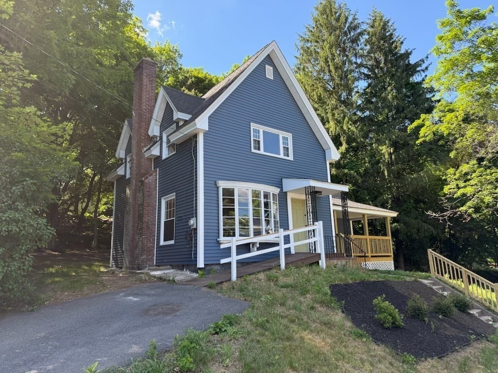 37 Bridge Street Monson, MA 01057 - Photo 22 of 35 front view of a house with a yard