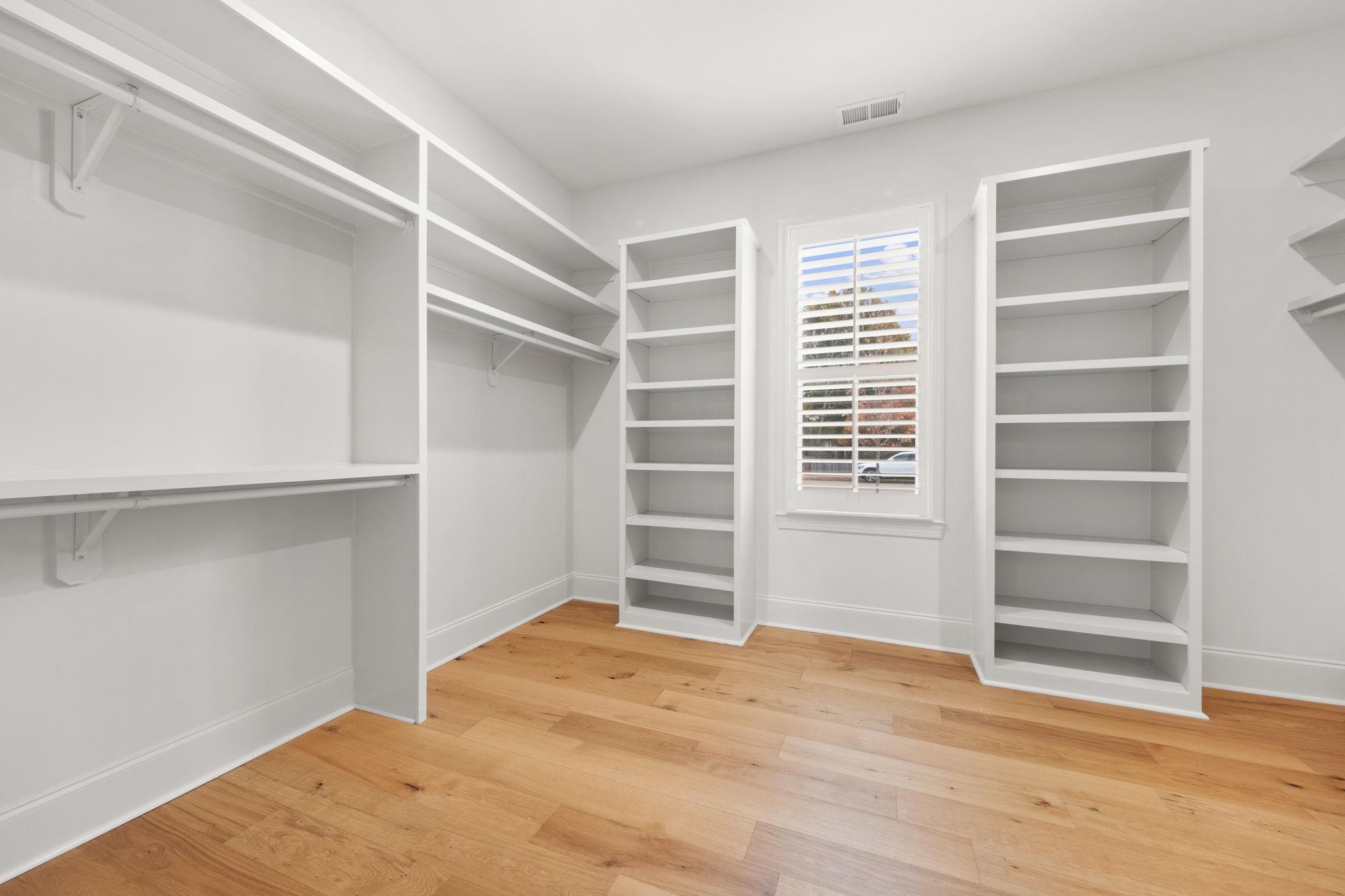 3361 Bailey Station Road Collierville, TN 38017 - Photo 22 of 40 a view of an empty room with empty shelves