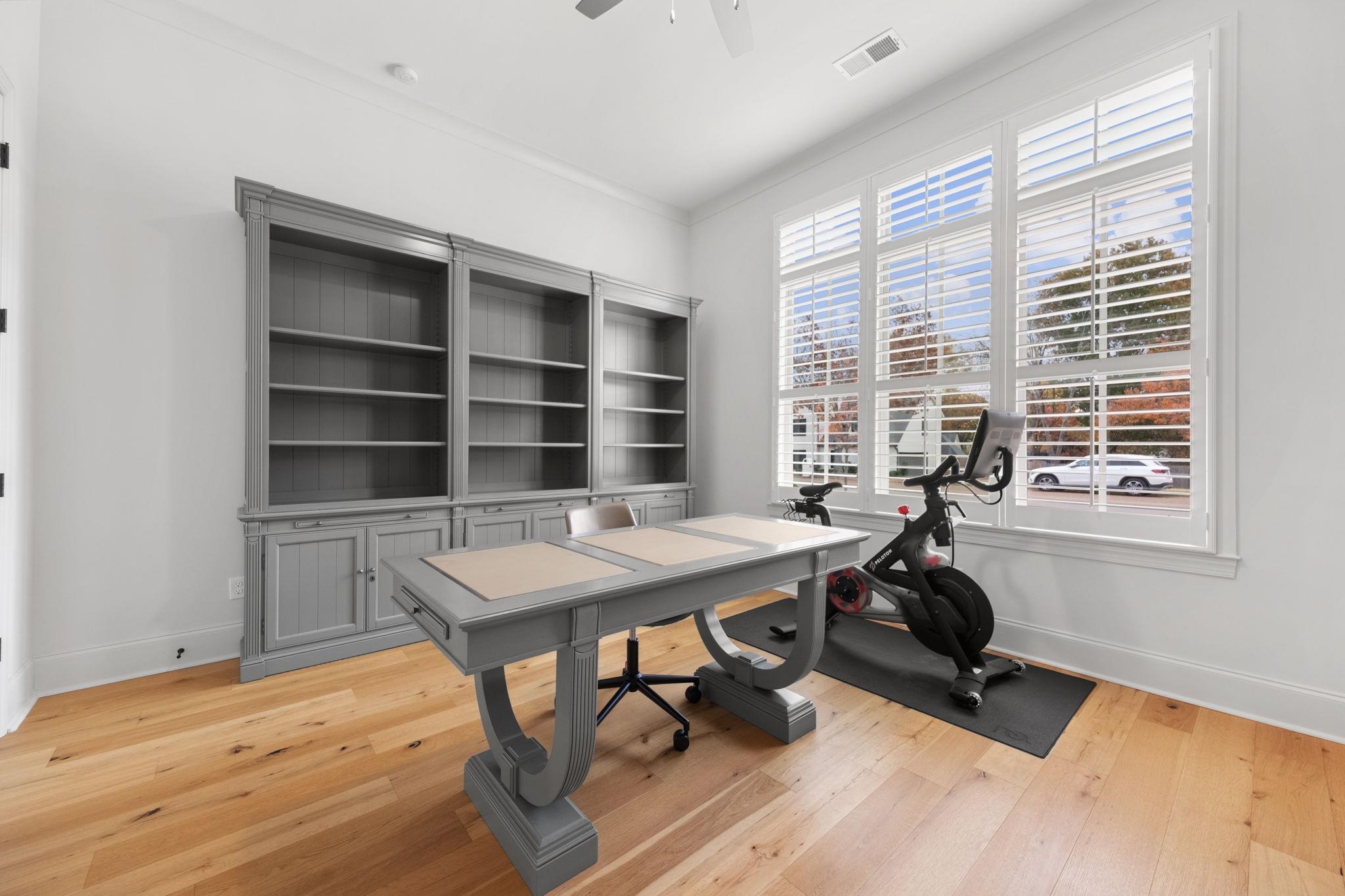 3361 Bailey Station Road Collierville, TN 38017 - Photo 23 of 40 a view of a workspace with furniture and a window