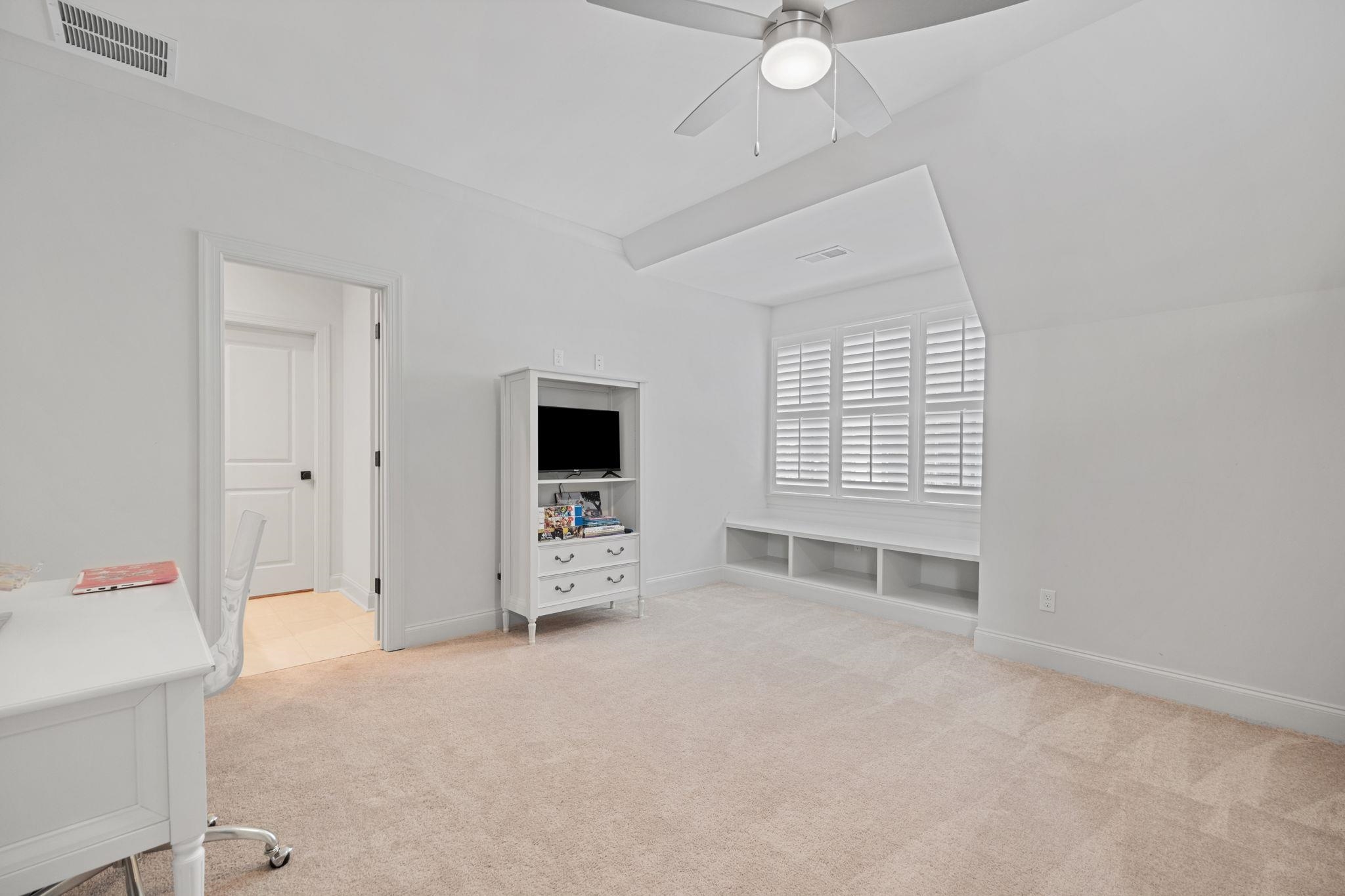 3361 Bailey Station Road Collierville, TN 38017 - Photo 27 of 40 an empty room with cabinet and windows