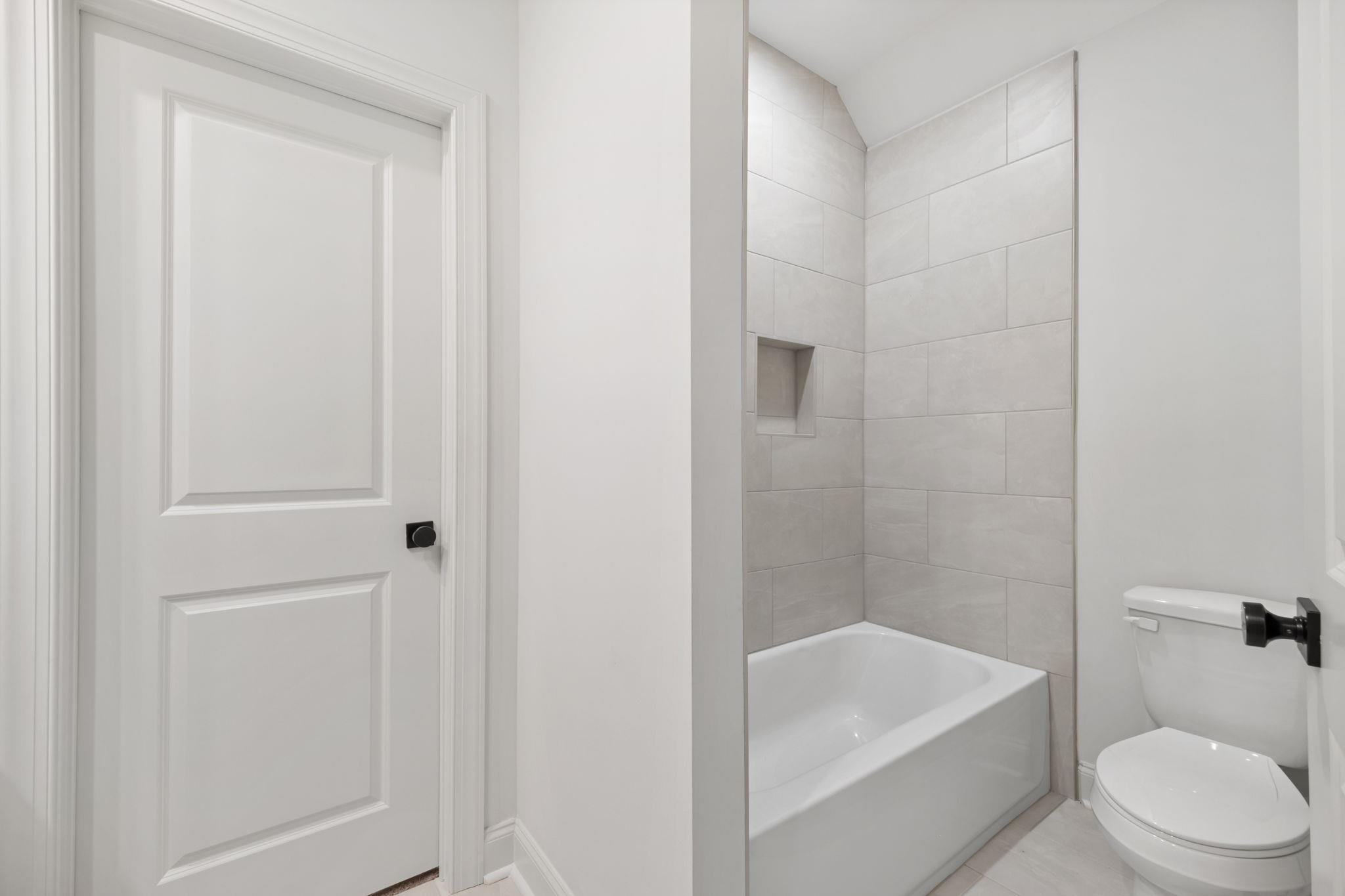 3361 Bailey Station Road Collierville, TN 38017 - Photo 28 of 40 a bathroom with a sink a toilet and shower