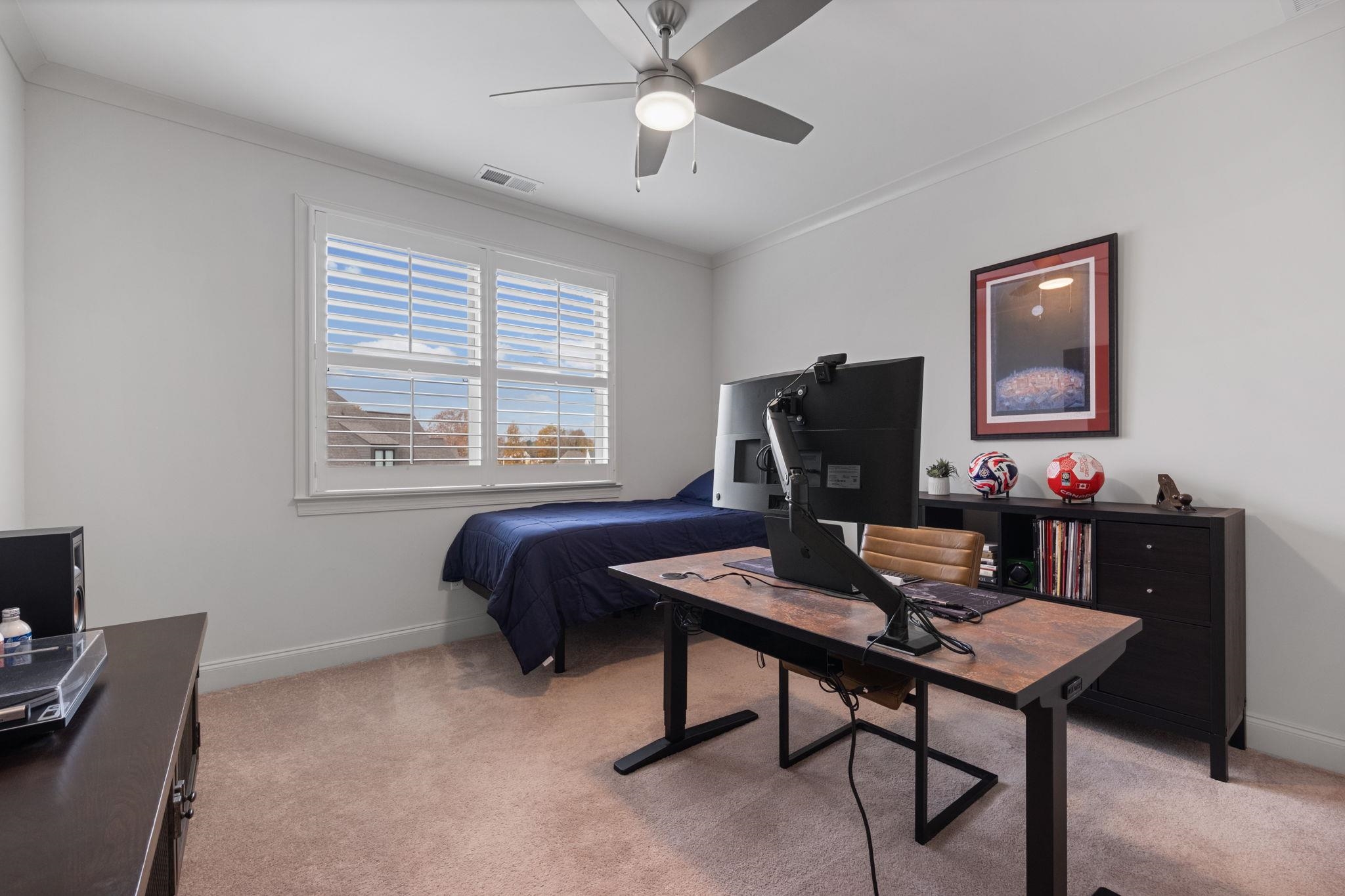 3361 Bailey Station Road Collierville, TN 38017 - Photo 29 of 40 a view of a workspace with furniture and a window