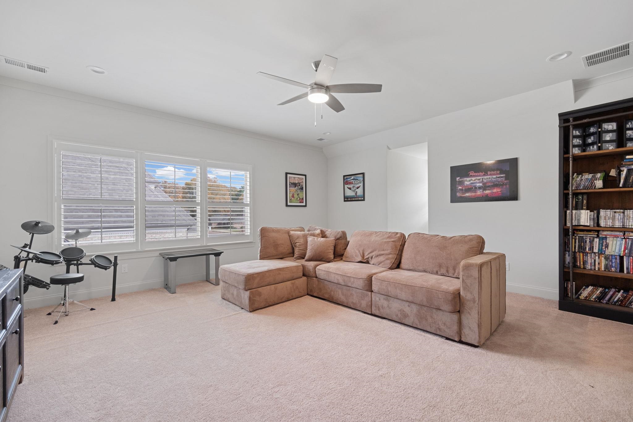 3361 Bailey Station Road Collierville, TN 38017 - Photo 31 of 40 a living room with furniture and a large window
