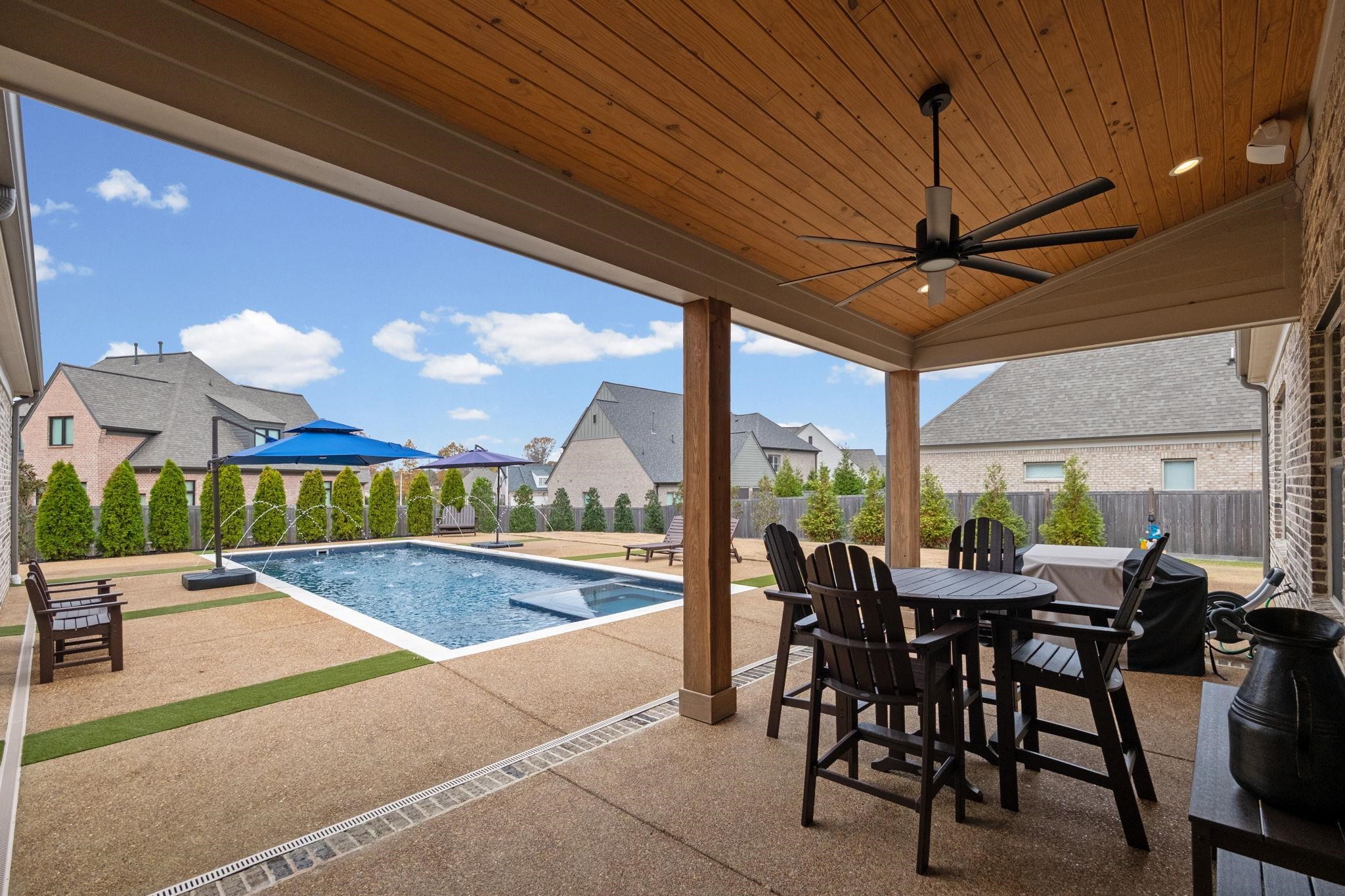 3361 Bailey Station Road Collierville, TN 38017 - Photo 34 of 40 a view of a patio with a table and chairs