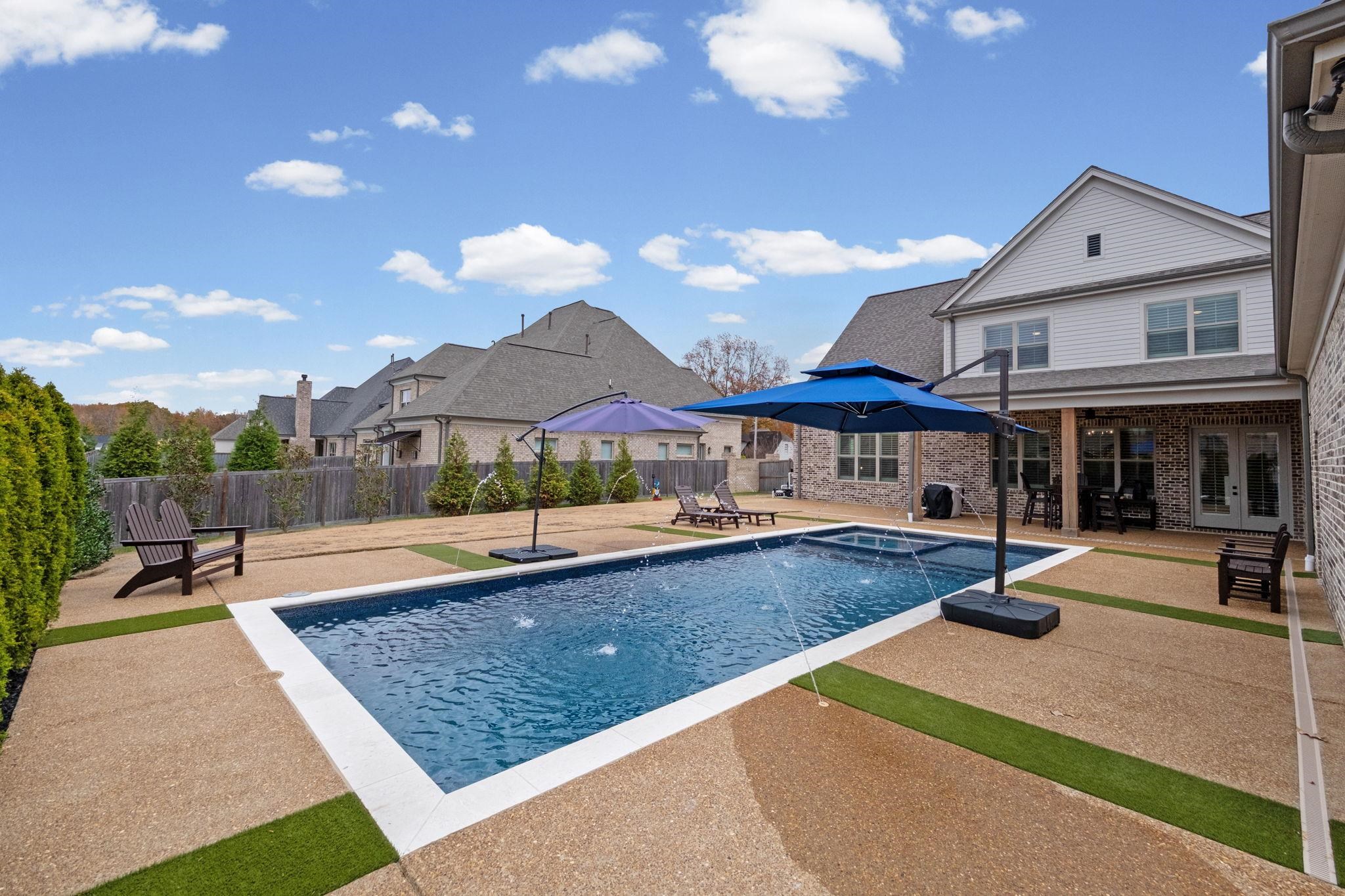3361 Bailey Station Road Collierville, TN 38017 - Photo 35 of 40 a view of an house with swimming pool and chairs