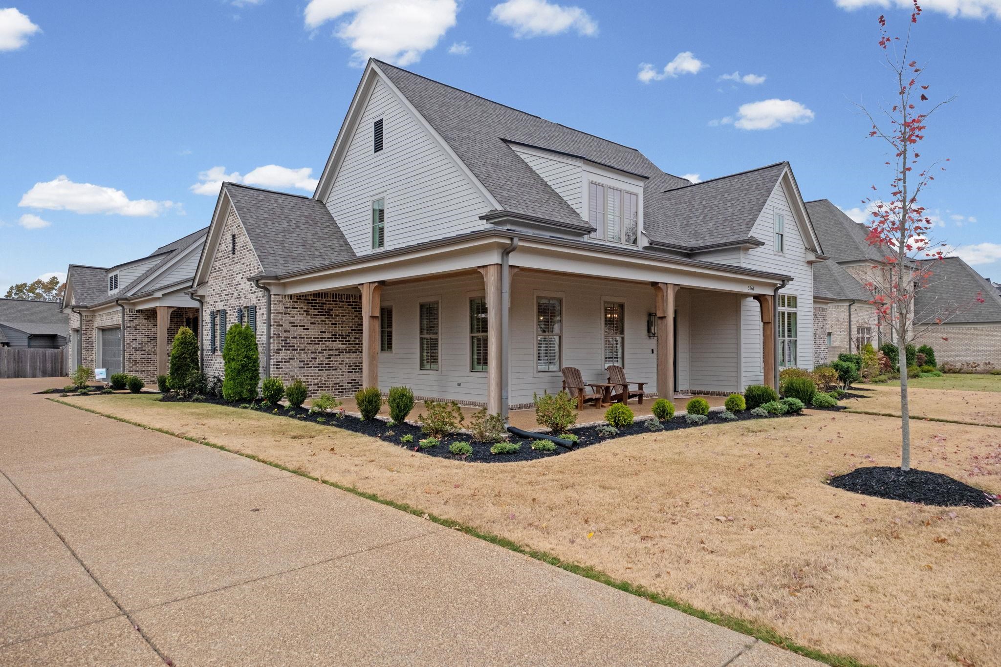 3361 Bailey Station Road Collierville, TN 38017 - Photo 36 of 40 a front view of a house with a garden and plants