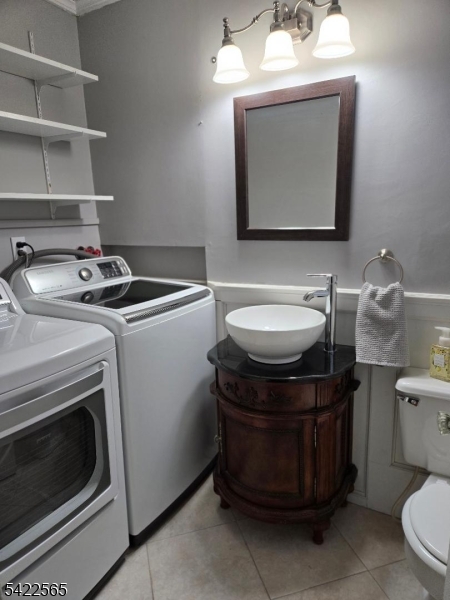 1 Pioneer Trail Oak Ridge, NJ 07438 - Photo 11 of 23 a bathroom with a stove a sink and a mirror