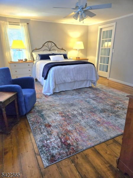 1 Pioneer Trail Oak Ridge, NJ 07438 - Photo 12 of 23 a spacious bedroom with a bed and a window