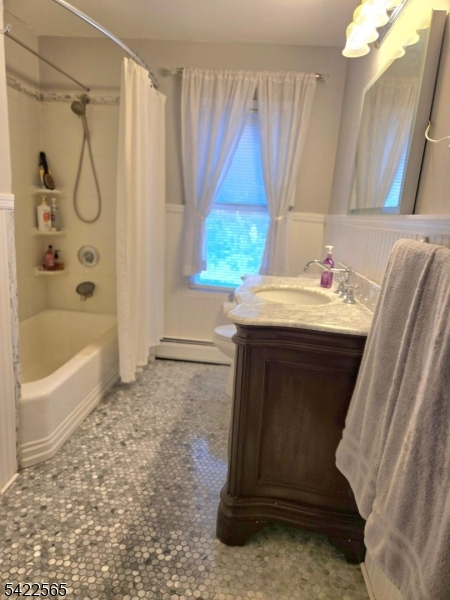 1 Pioneer Trail Oak Ridge, NJ 07438 - Photo 13 of 23 a bathroom with a sink and a bathtub