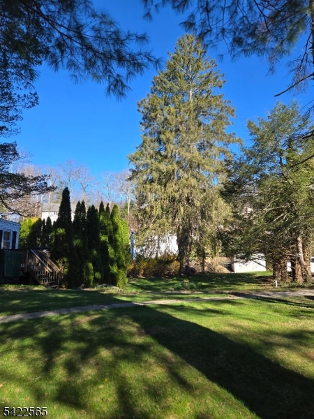 1 Pioneer Trail Oak Ridge, NJ 07438 - Photo 22 of 23 a garden view with a fountain