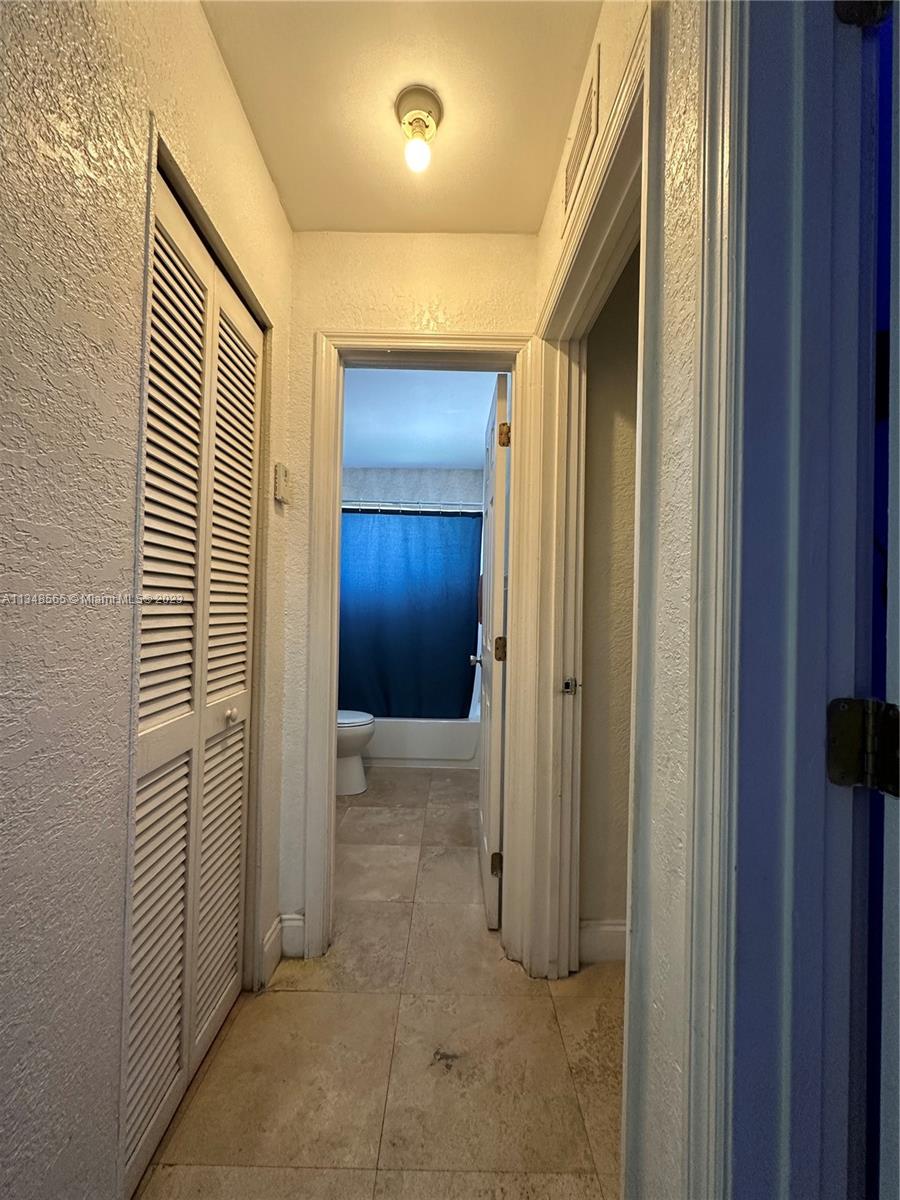 680 Southwest 10th Street, Unit 7 Miami, FL 33130 - Photo 18 of 34 a view of a hallway