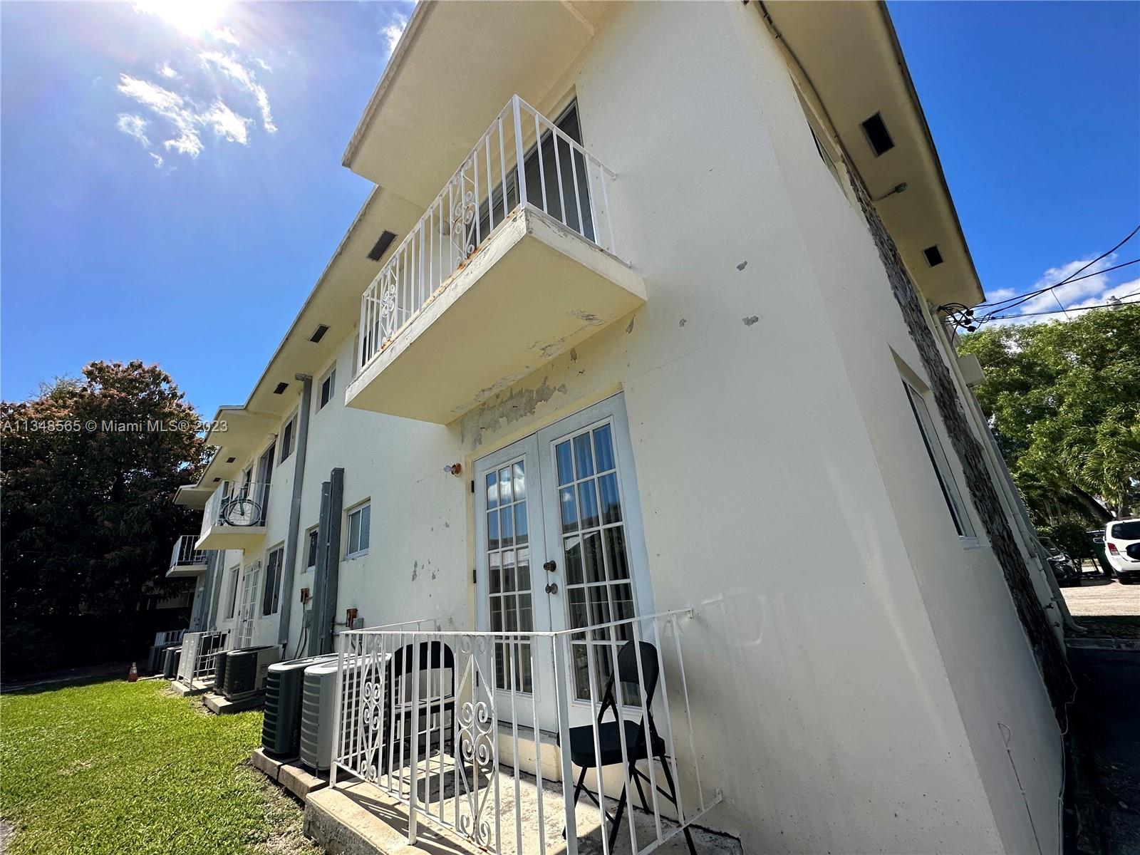 680 Southwest 10th Street, Unit 7 Miami, FL 33130 - Photo 3 of 34 a view of balcony with furniture