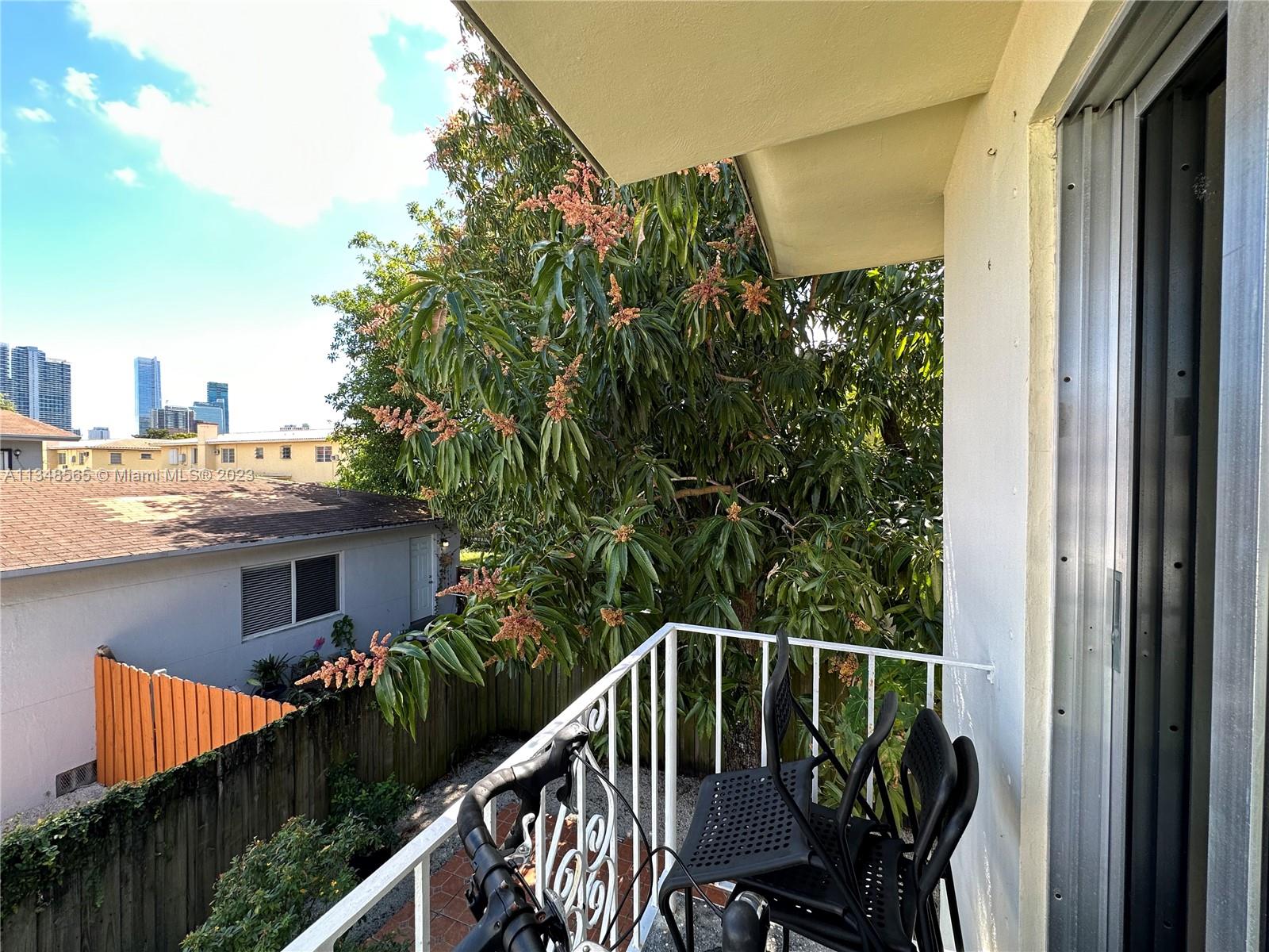 680 Southwest 10th Street, Unit 7 Miami, FL 33130 - Photo 34 of 34 a balcony with an outdoor space