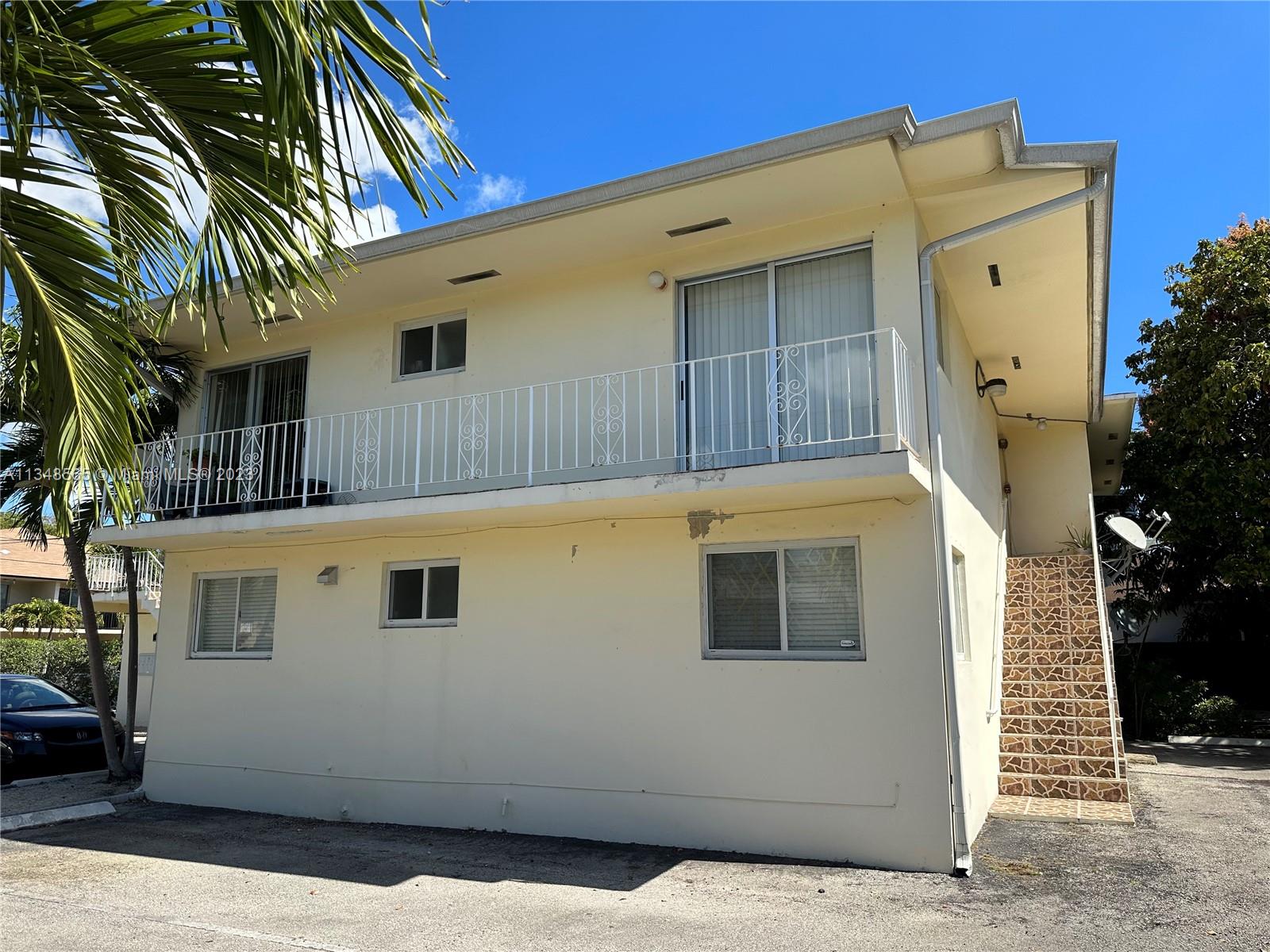 680 Southwest 10th Street, Unit 7 Miami, FL 33130 - Photo 4 of 34 a front view of a house with balcony