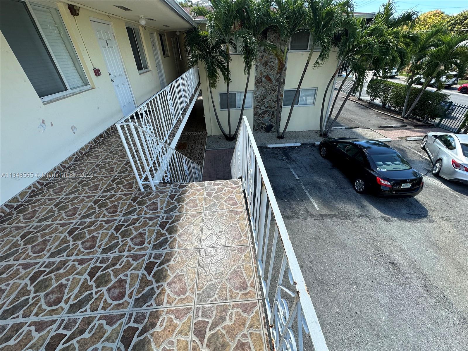 680 Southwest 10th Street, Unit 7 Miami, FL 33130 - Photo 7 of 34 a view of car parked on street