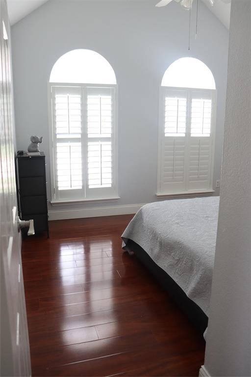 7916 Country Ridge Lane Plano, TX 75024 - Photo 16 of 27 an empty room with wooden floor and windows
