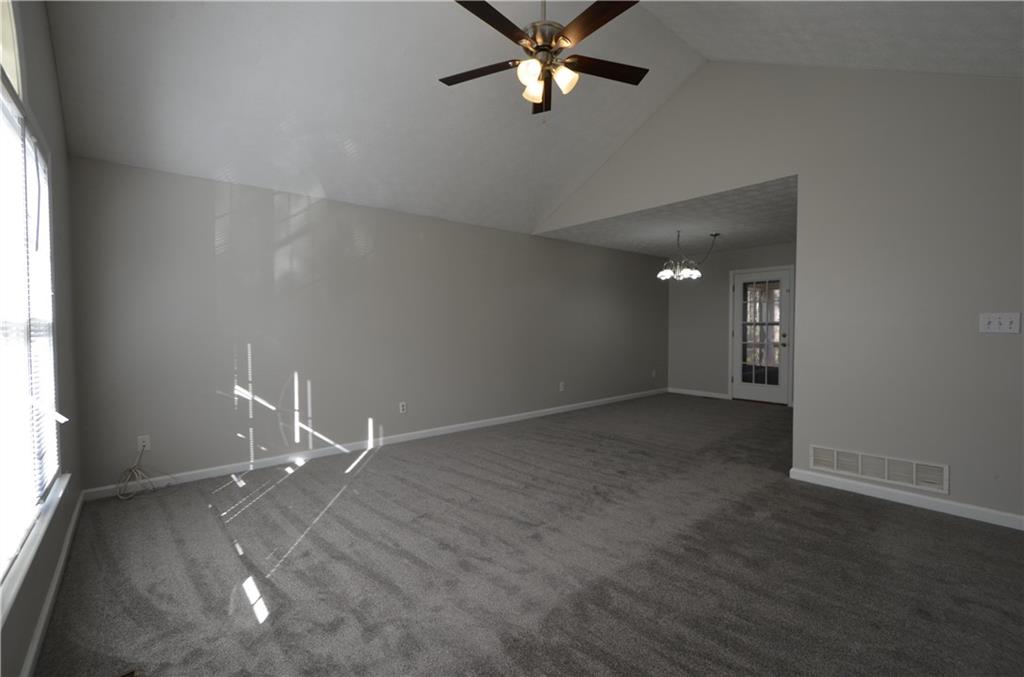 140 Stewart Drive Dallas, GA 30132 - Photo 3 of 21 a view of an empty room with a window