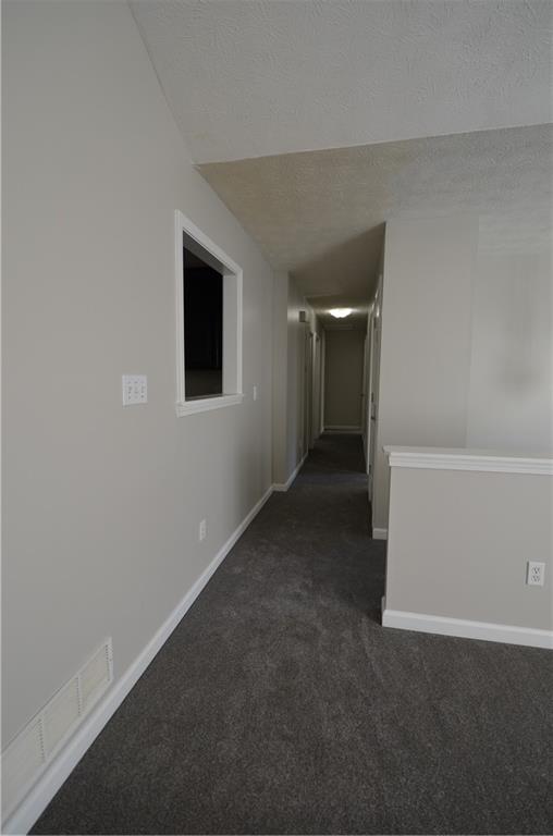 140 Stewart Drive Dallas, GA 30132 - Photo 8 of 21 a view of an empty room with a window