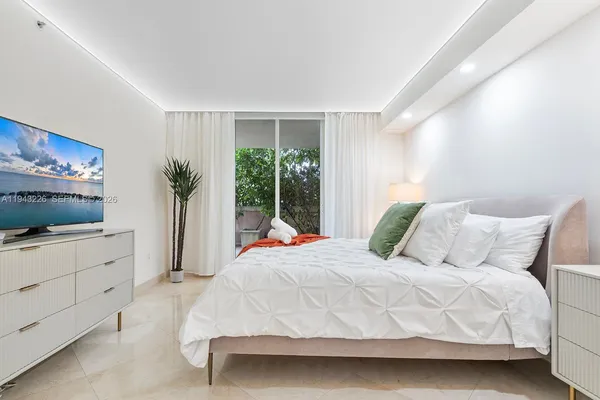 a bedroom with a bed and a closet