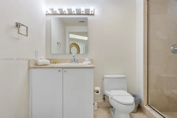 a view of a hallway with washer and dryer