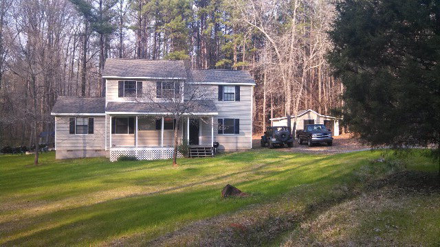 726 Comer Road Gray, GA 31032 - Photo 1 of 8 a view of a house with a yard