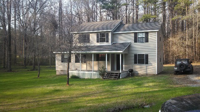 726 Comer Road Gray, GA 31032 - Photo 2 of 8 a view of a house with a yard and sitting area