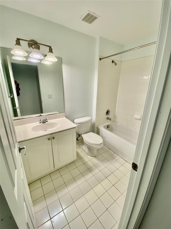 8720 Cypress Walk Court, Unit 8720 Tamarac, FL 33321 - Photo 33 of 36 a bathroom with a sink toilet and shower
