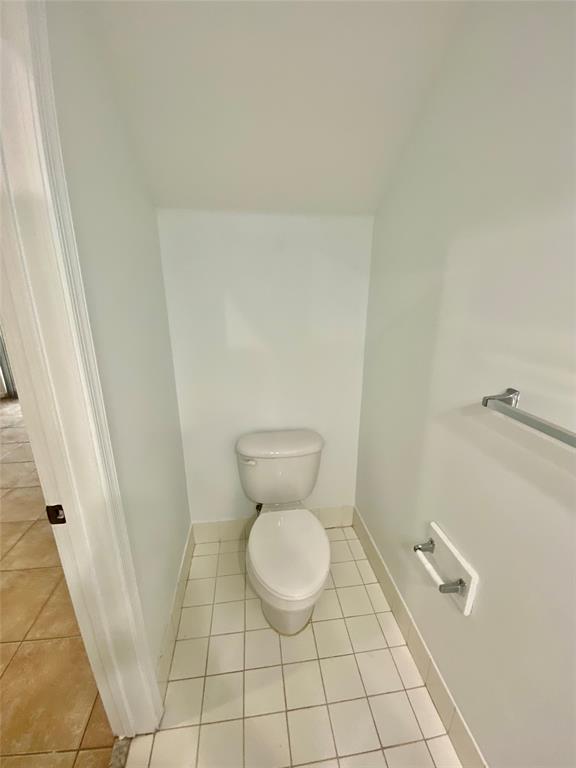 8720 Cypress Walk Court, Unit 8720 Tamarac, FL 33321 - Photo 7 of 36 a bathroom with a toilet